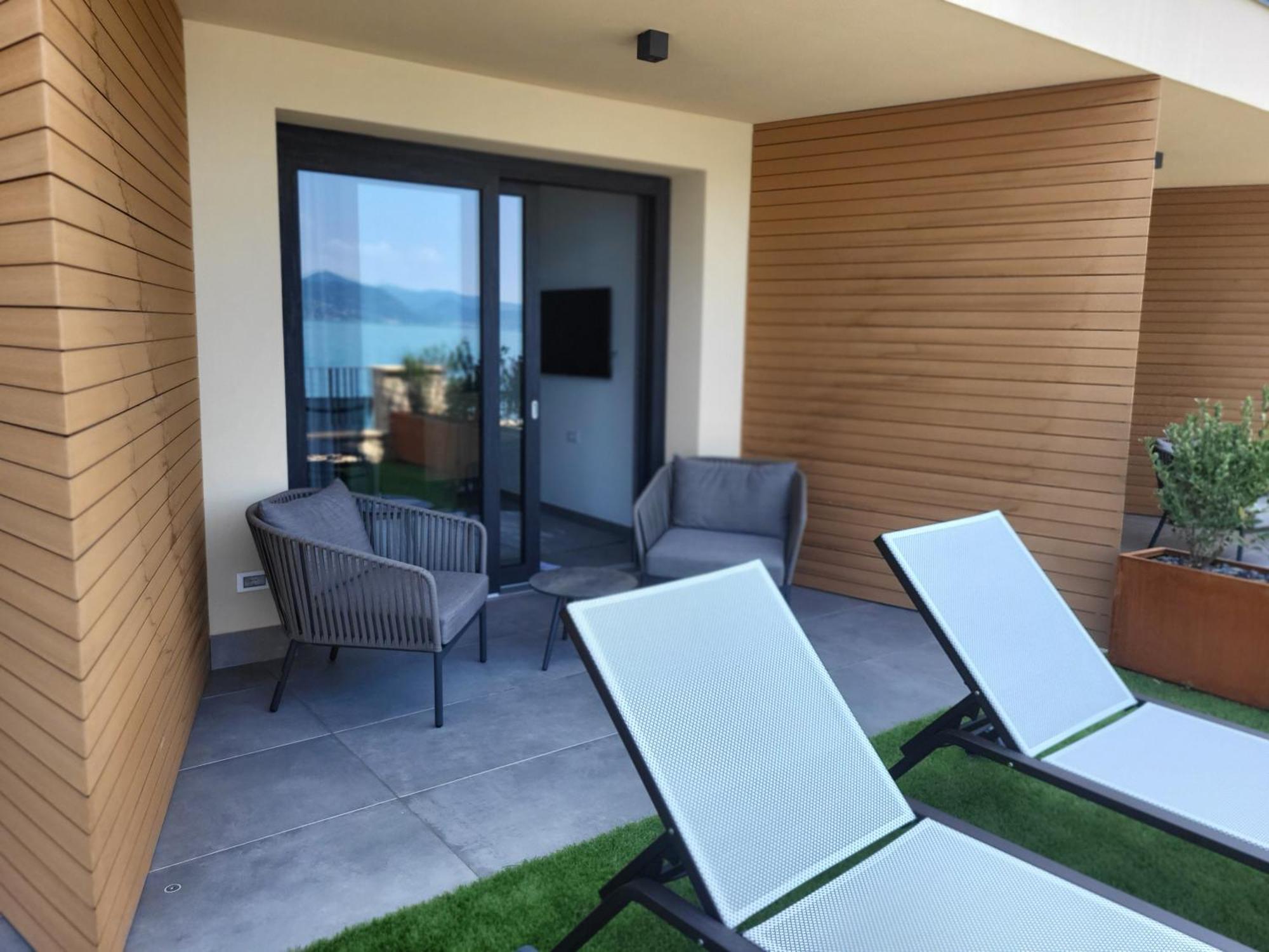 Attilio High Living Suites - Adults Only Torri Del Benaco Quarto foto